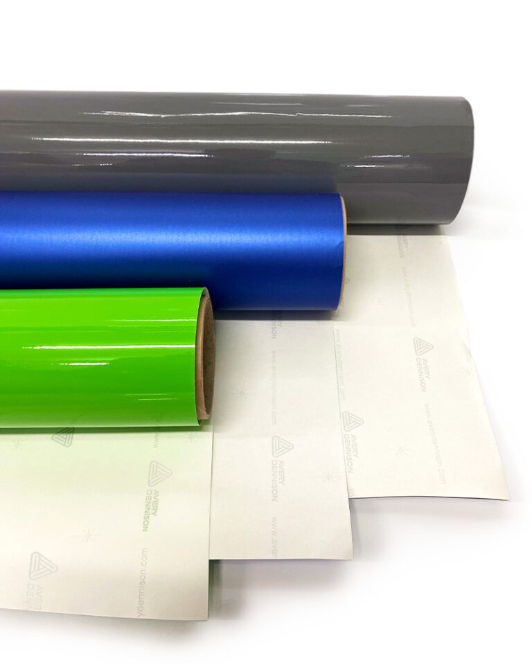 Avery Dennison Supreme wrap rolls of rock grey, metallic blue and lime green
