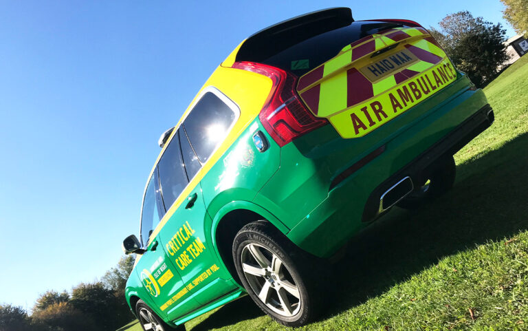Hampshire and Isle of Wight green and yellow air ambulance with Chapter 8 chevron kit