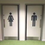 Cut vinyl men's and women's toilet door graphics