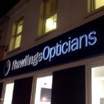 Backlit Rawlings Opticians fascia sign