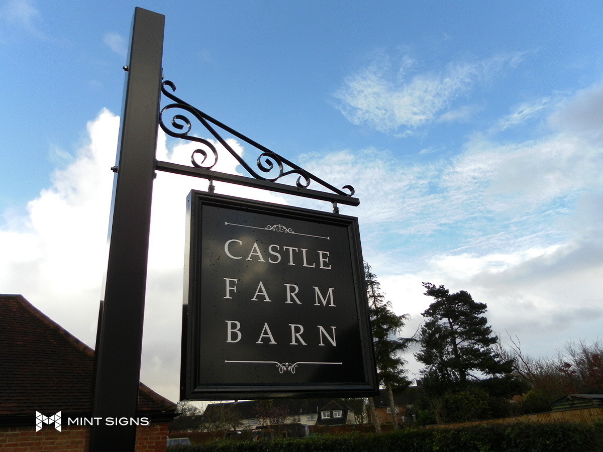 swing-projection-sign-castle-farm-barn